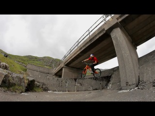 parkour on a bike, very interesting and beautifully filmed.